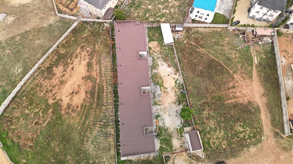 Petals, Life Camp: aerial view of the roofed terrace block and gatehouse